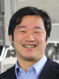 上坂 友洋 部長の写真