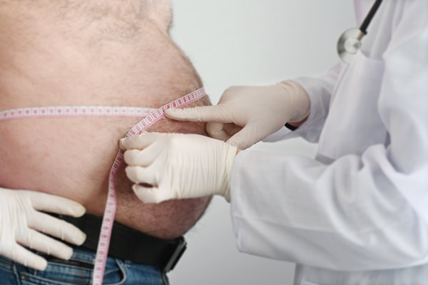 Image of a man and a doctor